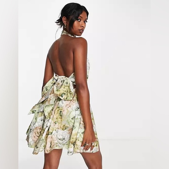 ASOS DESIGN Halter mini dress with bow back in floral print - Picture 2 of 14